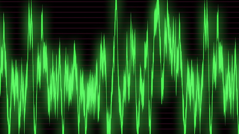 Large green graph of sound waves on the oscilloscope